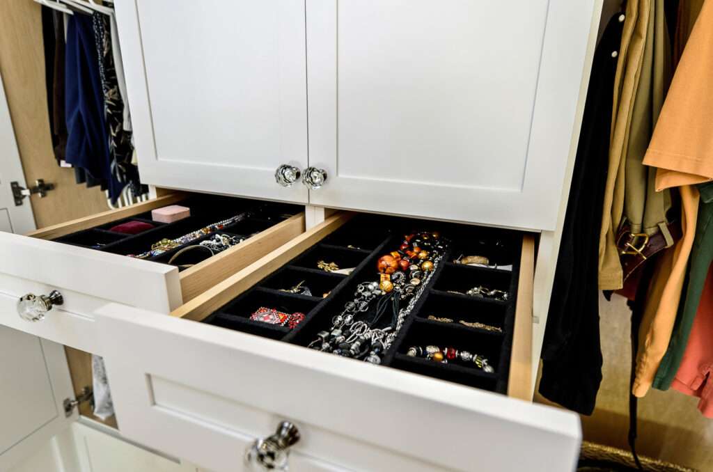 Jewelry tray in a drawer in the closet