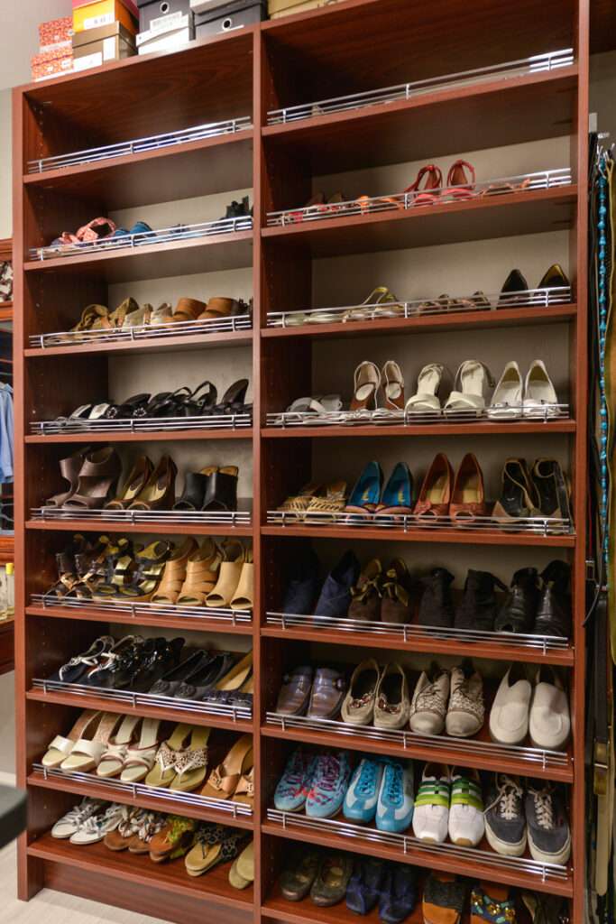 Photo of shelves filled with fancy shoes.